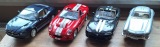 4 Modellautos 1:18Maßstab Vitrinestücke nicht bespielt NEUEI...