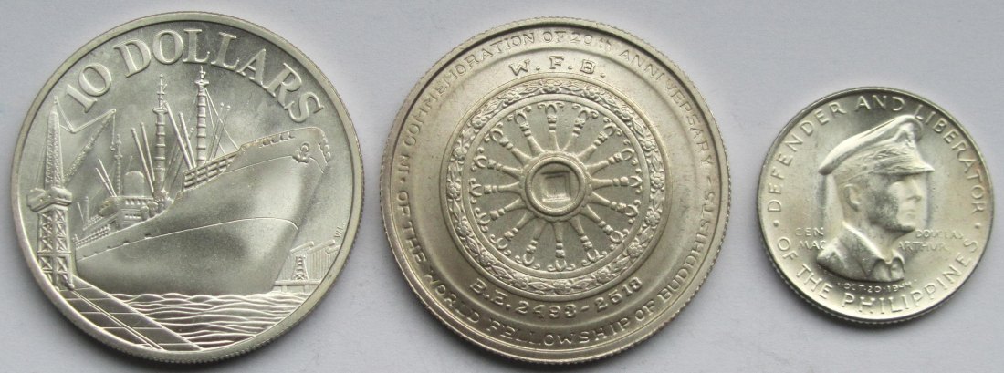  Asien: Lot aus drei Silbermünzen, zusammen 45,3 g Feinsilber   