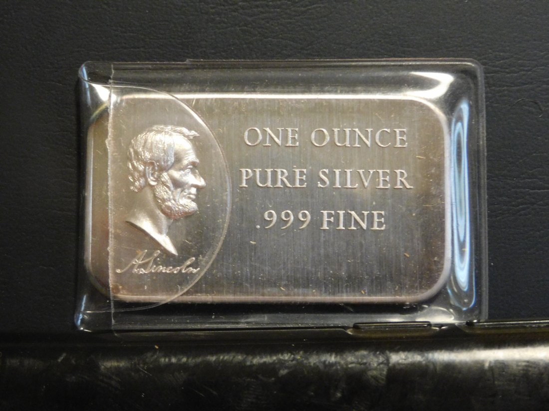 MADISON MINT 1 OUNCE SILVER.GRADE-PLEASE SEE PHOTOS.