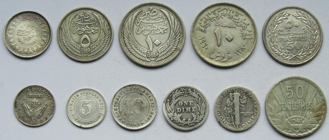  Lot aus elf Silbermünzen aus aller Welt, zusammen 31,9 g Feinsilber   