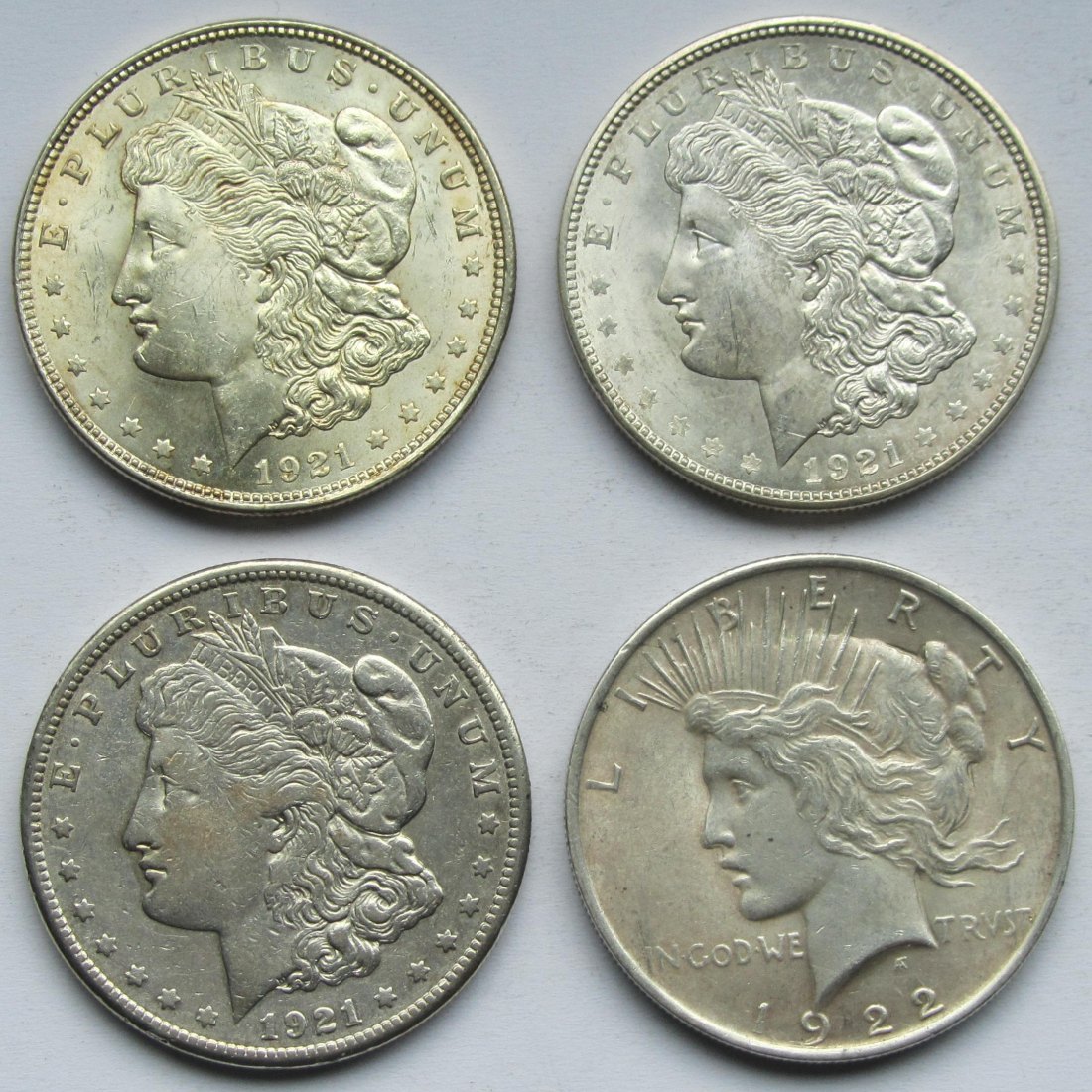  USA Vereinigte Staaten: Lot aus vier Silberdollars (1921 + 1921 D + 1921 S + 1922)   