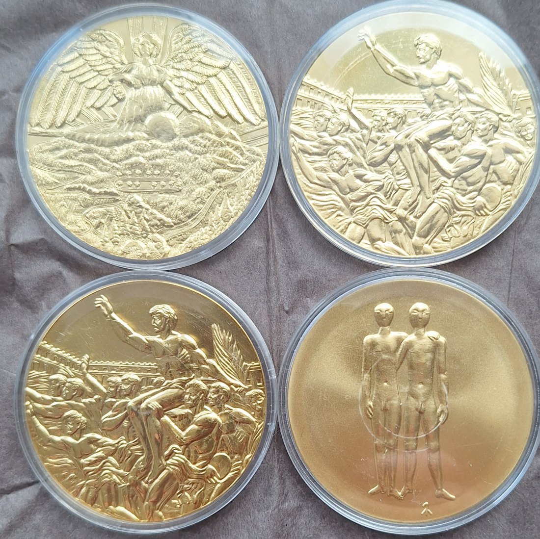  4 verschiedene Medaillen Olympische Spiele - siehe Bilder unedel gekapselt   