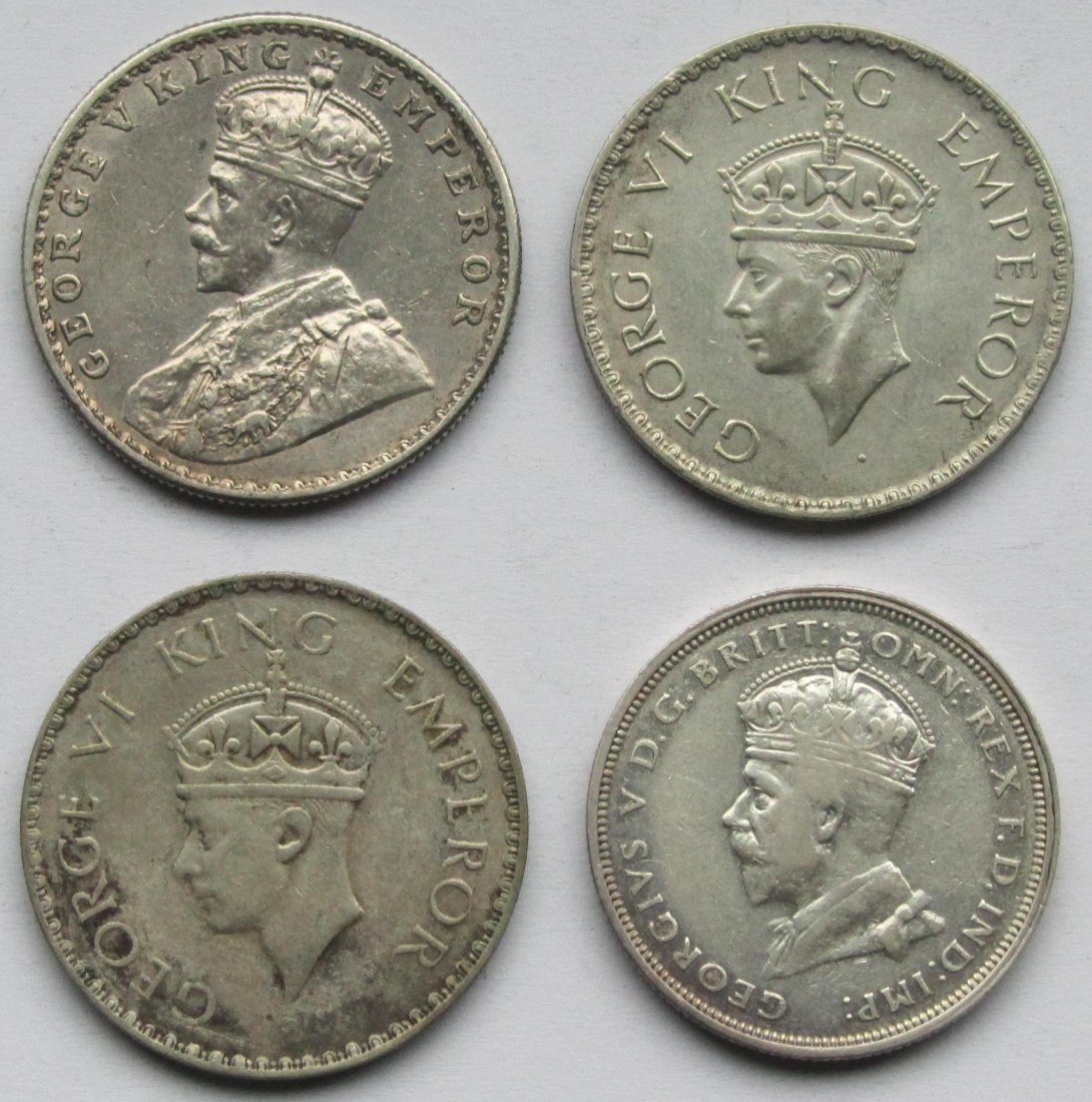  Indien/Australien: Lot aus vier Silbermünzen, zusammen 32,8 g Feinsilber   