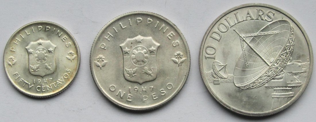  Philippinen/Singapur: Lot aus drei Silbermünzen, zusammen 39,1 g Feinsilber   