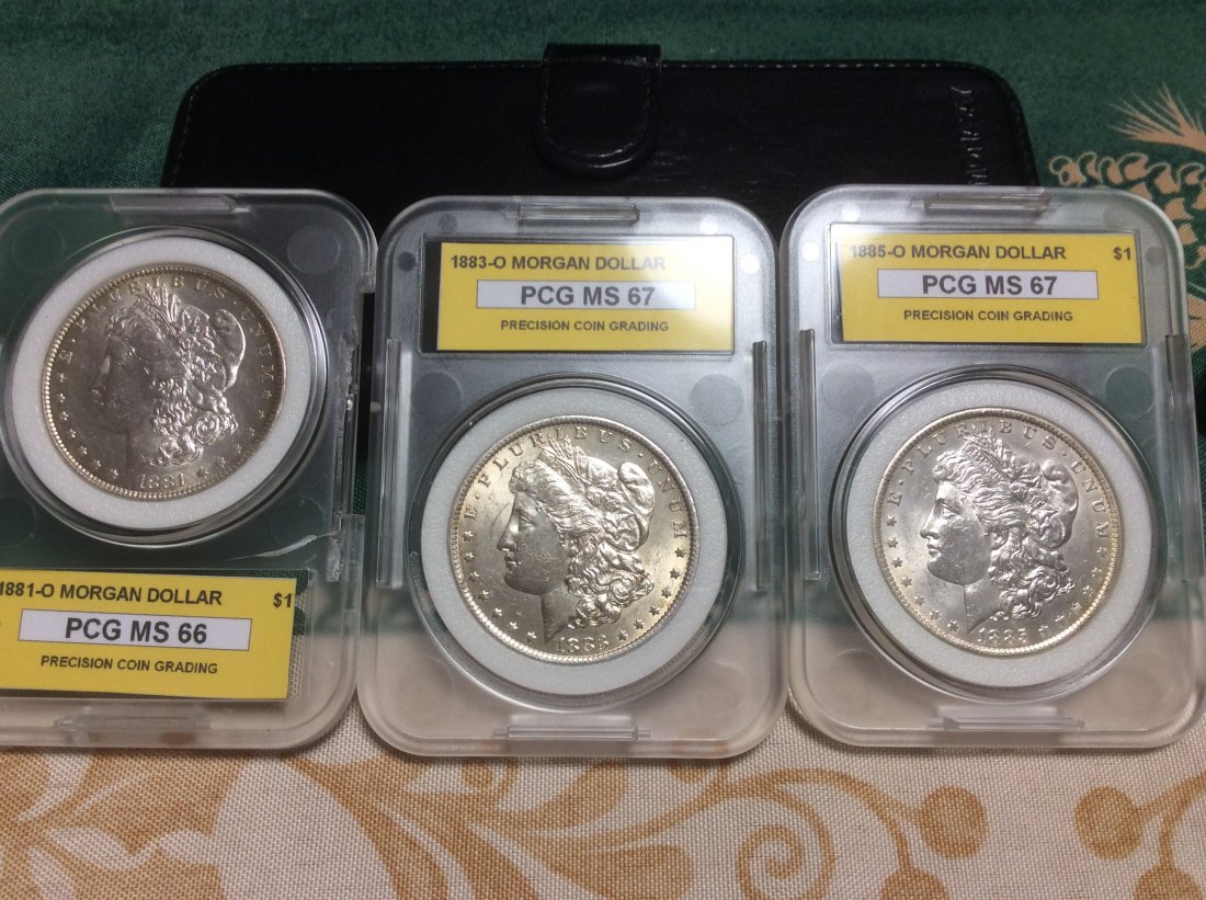 USA Lot Silber Morgan Dollar 1881 O, 1883 O und 1885 O in sehr guter Erhaltung