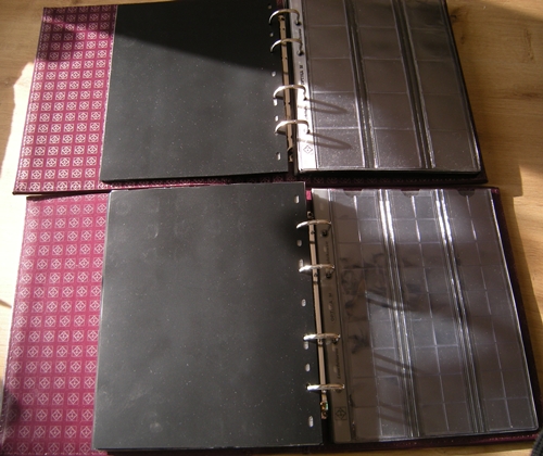  2 OPTIMA Münzalben mit Schutzhülle + 29 Münzhüllen und Zwischenblätter   