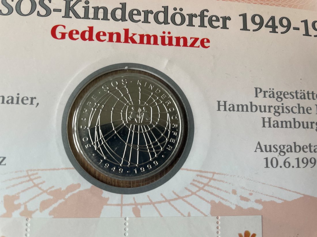  Numisblatt 2/1999 50 Jahre SOS Kinderdörfer 10 DM 925er silber   