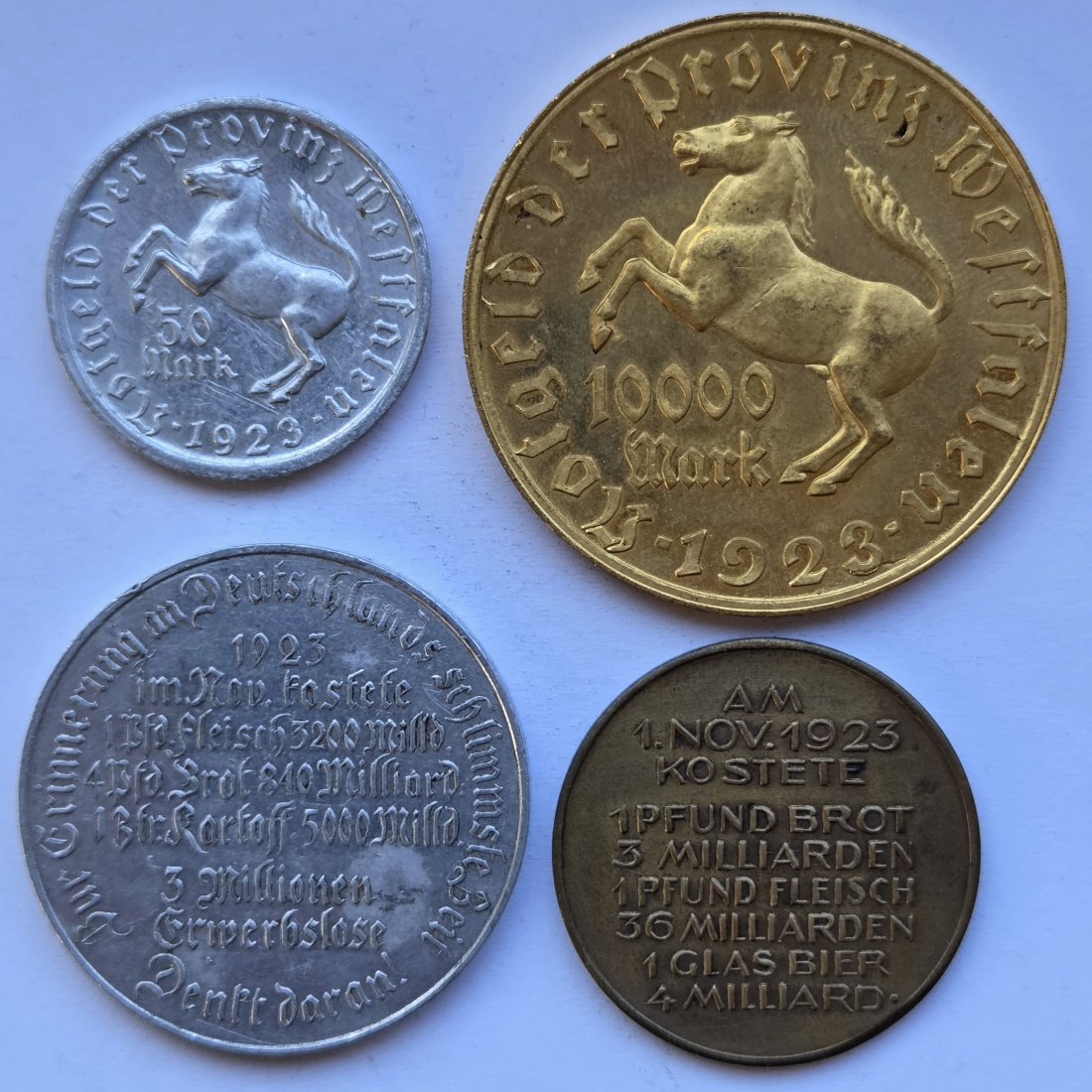  Notgeld: Lot aus zwei Münzen Westfalen und zwei Medaillen   