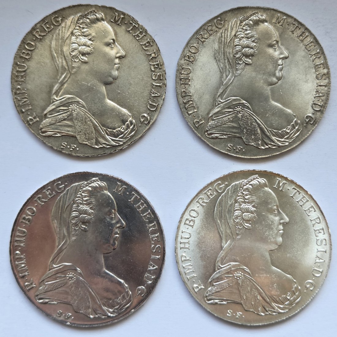  Österreich: Vier Maria-Theresia-Taler, zusammen 93,2 g Feinsilber   
