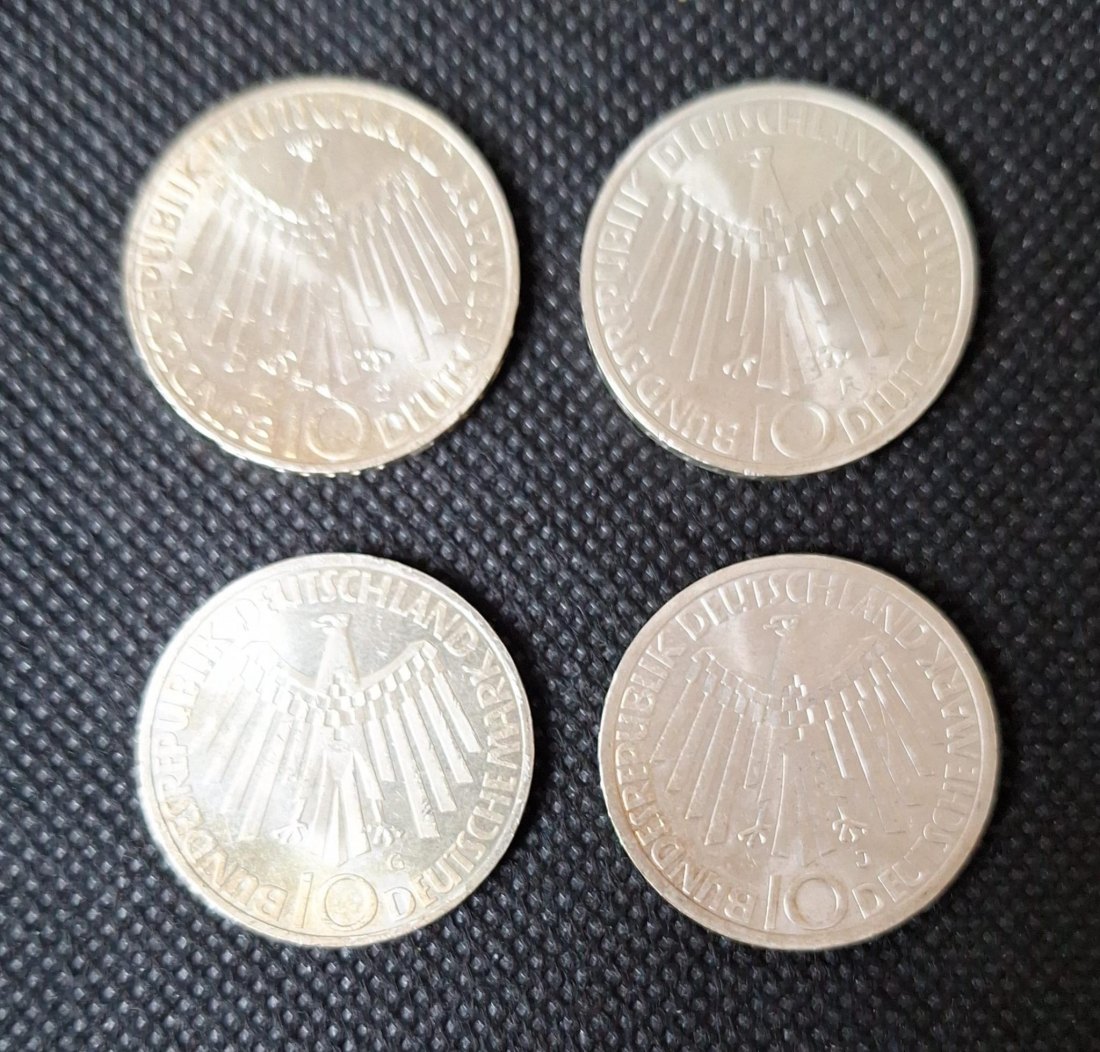  4 Silbermünzen: BRD 4 x 10 DM Olympische Spiele DFGJ, 5. Serie...in München, Feingewicht 38,76 Gramm   