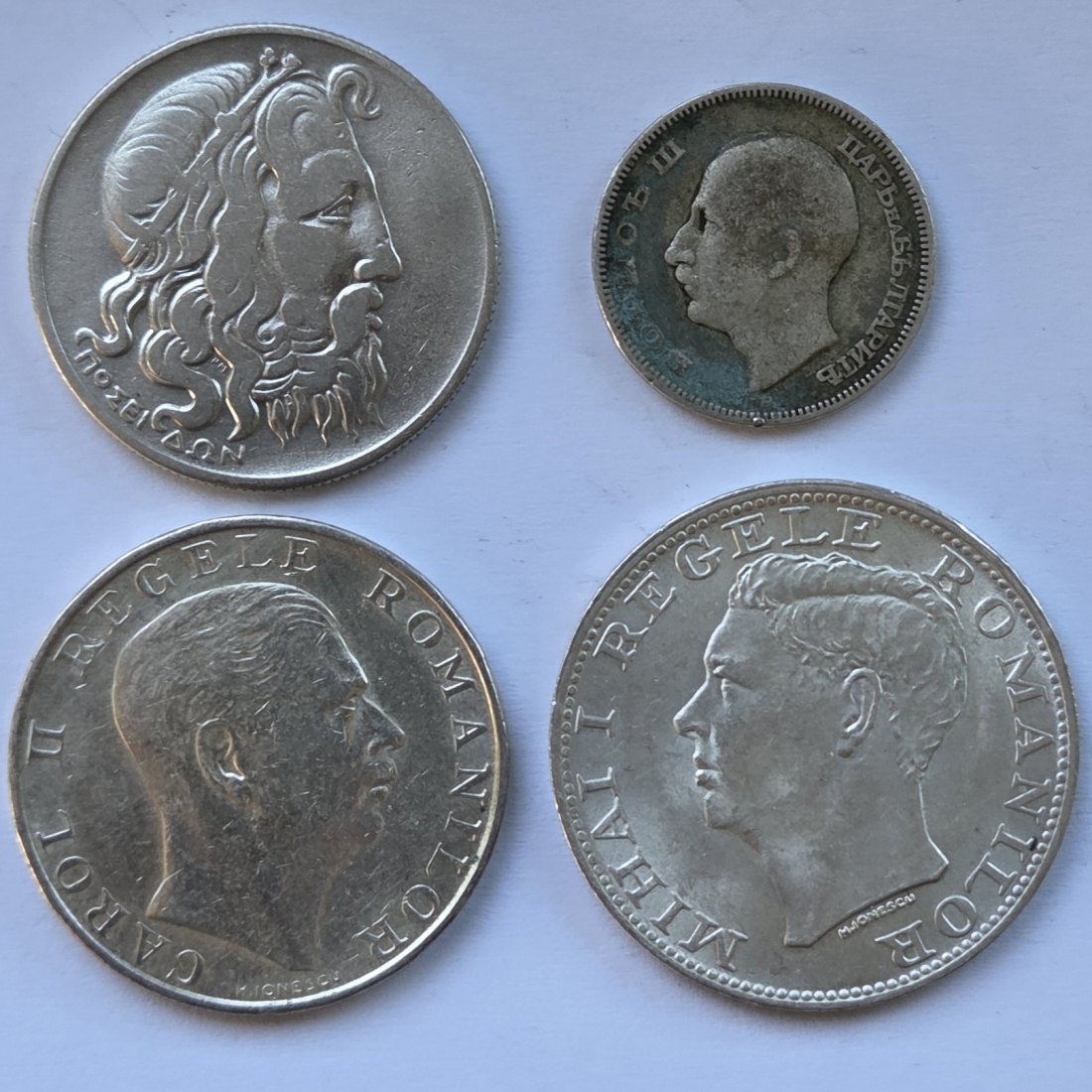  Südosteuropa: Lot aus vier Silbermünzen, zusammen 26 g Feinsilber   