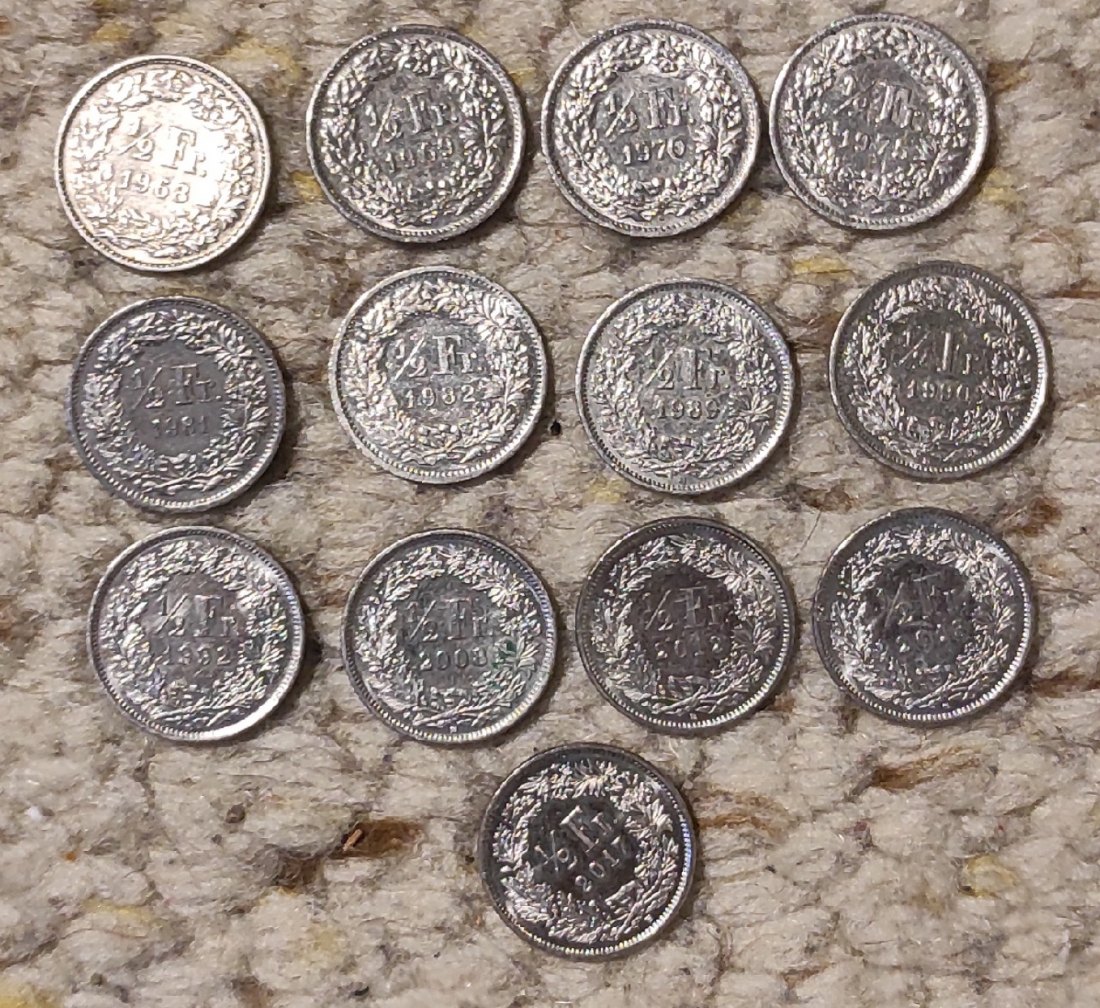  Set 002: Schweiz Münzlot mit 13 x 1/2 Franc Stücken verschiedener Jahrgänge   