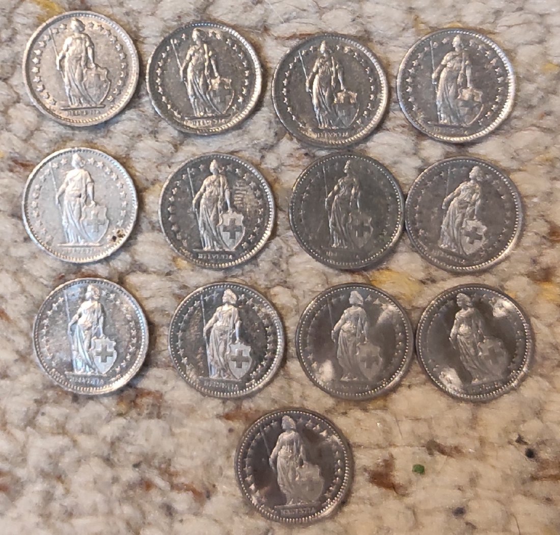  Set 002: Schweiz Münzlot mit 13 x 1/2 Franc Stücken verschiedener Jahrgänge   