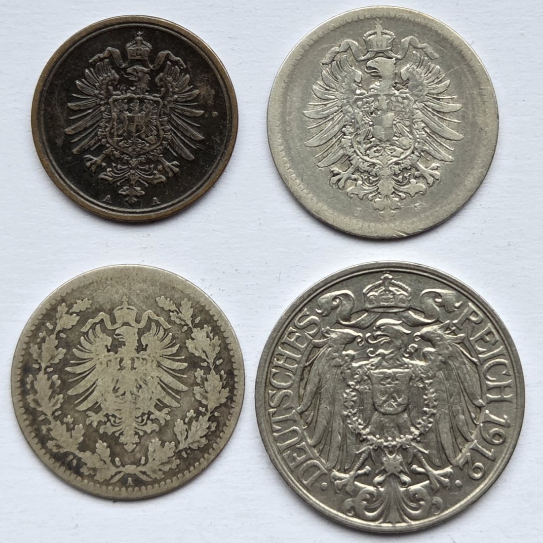  Kaiserreich: Lot aus vier Kleinmünzen   
