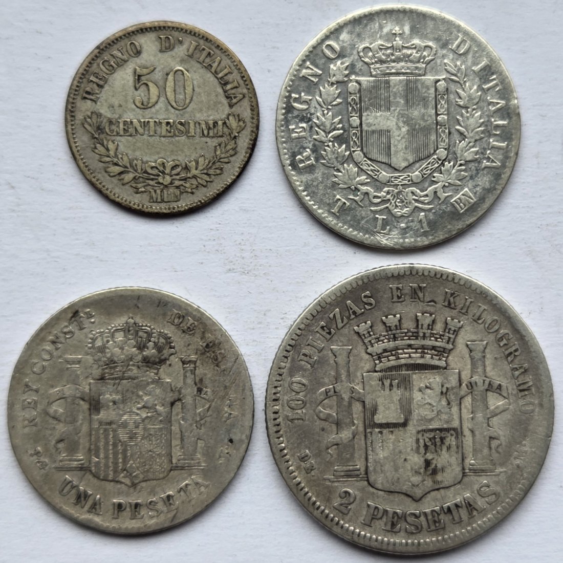  Italien/Spanien: Lot aus vier Silbermünzen, zusammen 18,8 g Feinsilber   
