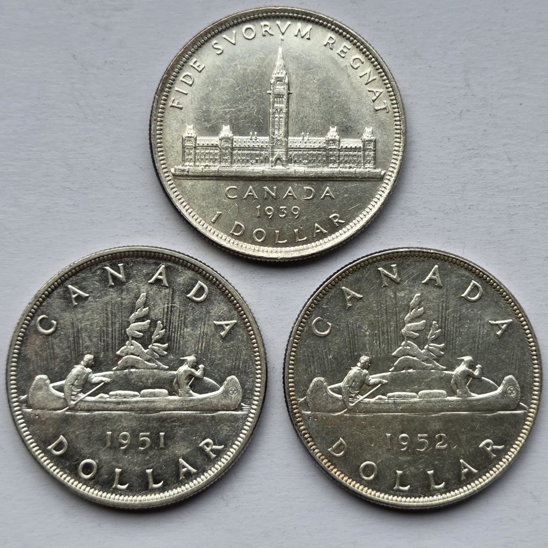  Kanada: Lot aus drei Silberdollars, zusammen 56 g Feinsilber   