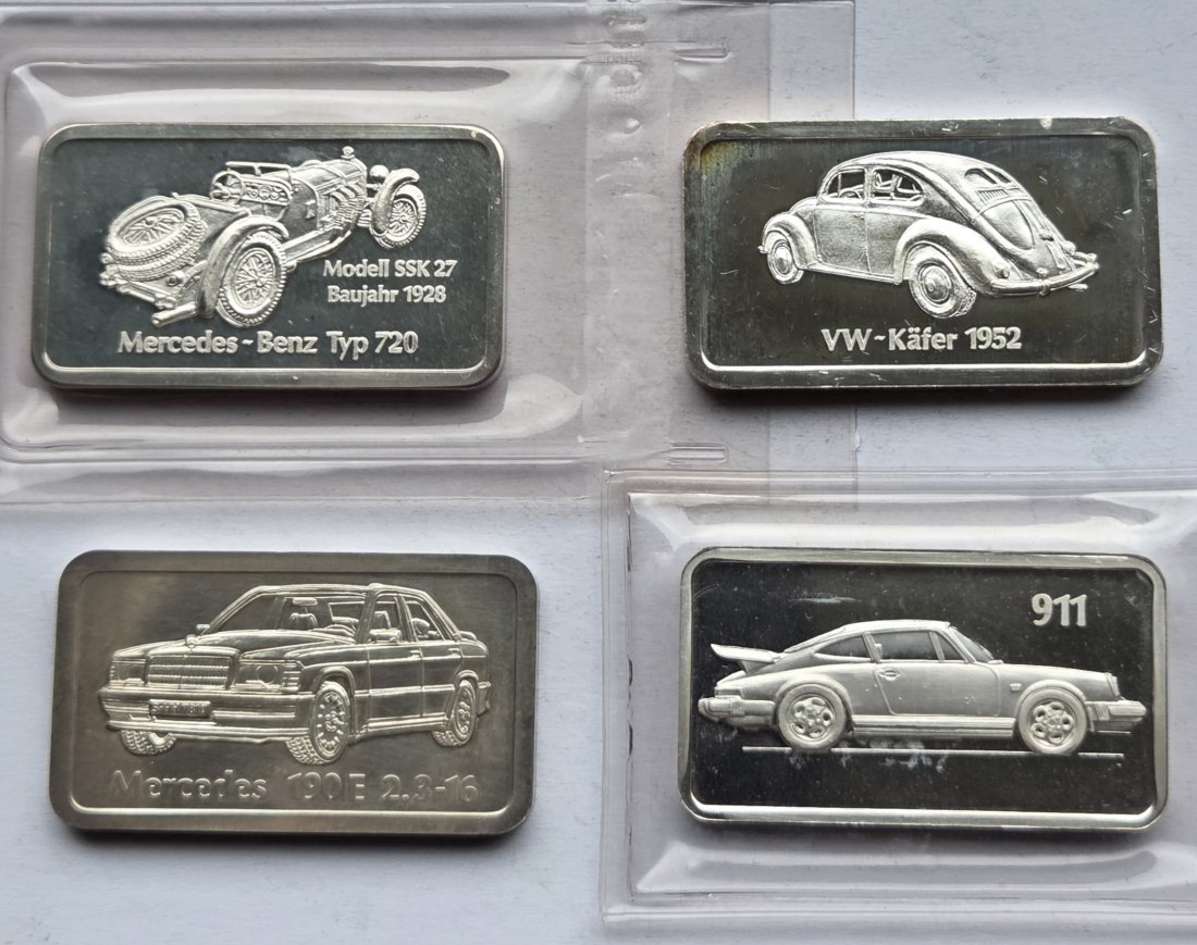  Vier Silberunzen-Barren Autos von Degussa/Heraeus, zusammen 124,4 g Feinsilber   