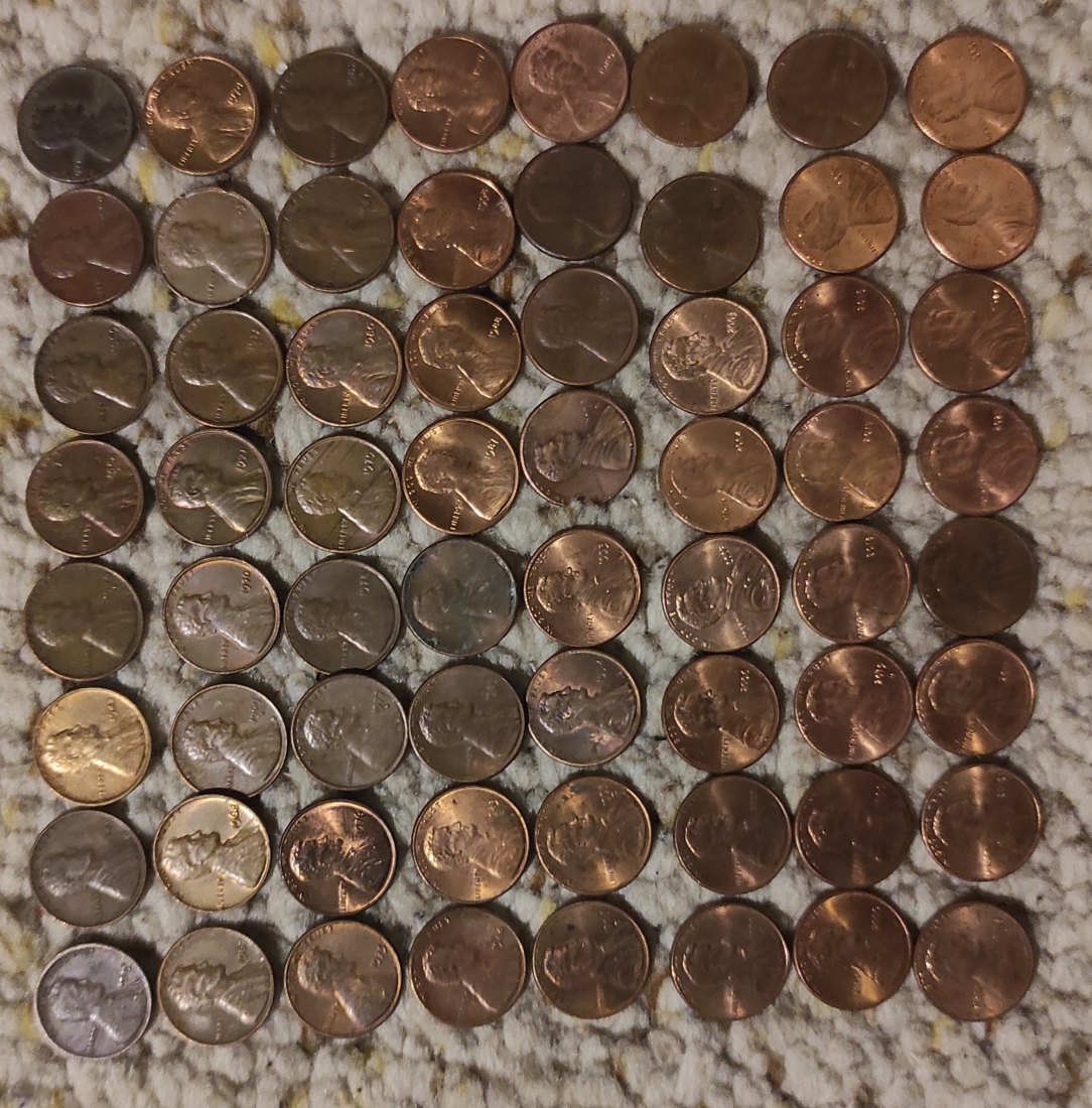  Set 025: USA Münzlot mit 64 x 1 Cent Münzen verschiedener Prägejahre   